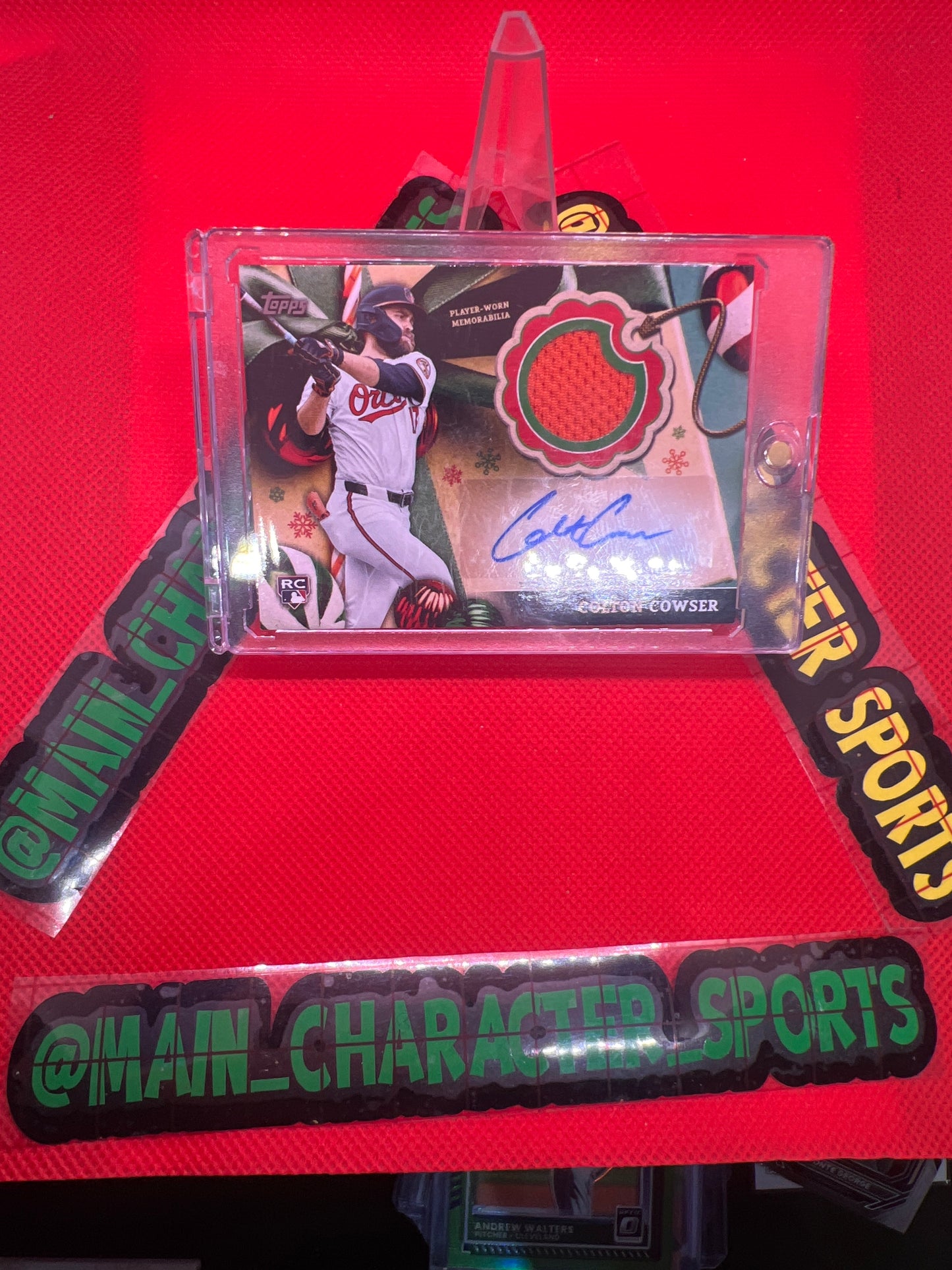 Colton Cowser Topps Holiday Series- Rookie Autographed card with game used memorabilia patch 10/50